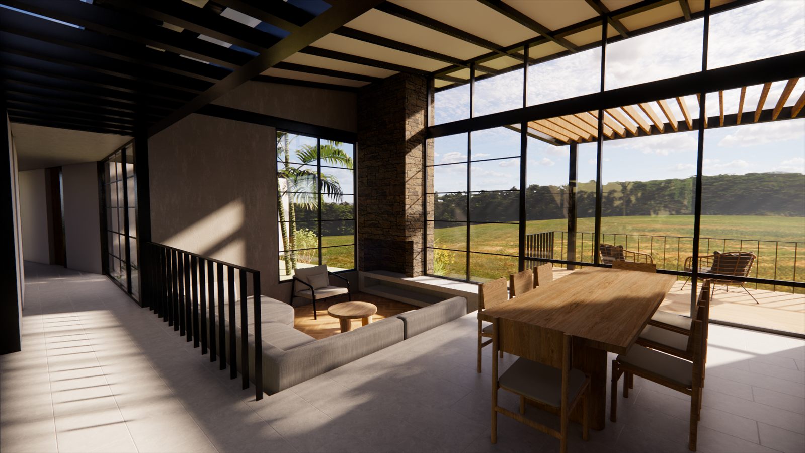 Casa Resiliencia — covered terrace with a long timber dining table looking out over the valley.