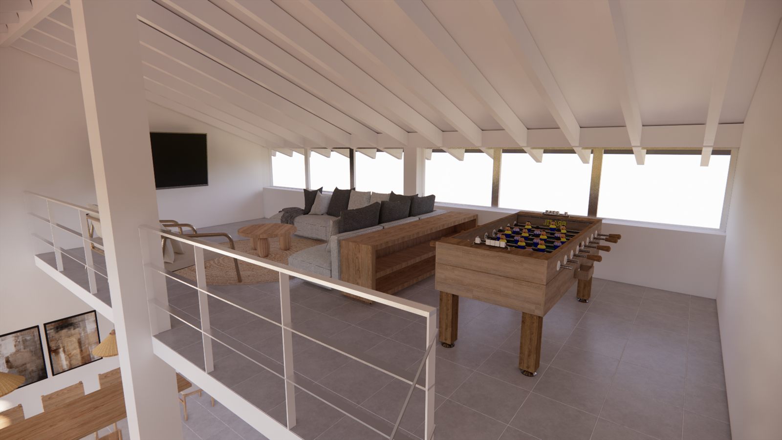 Coral Dreams & Ocean Whispers — mezzanine games room behind a steel balustrade.