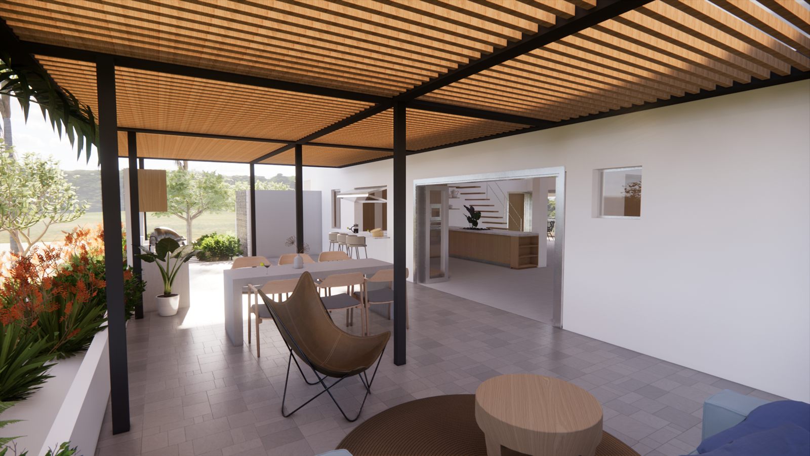 Coral Dreams & Ocean Whispers — terrace seating looking through to the outdoor kitchen.
