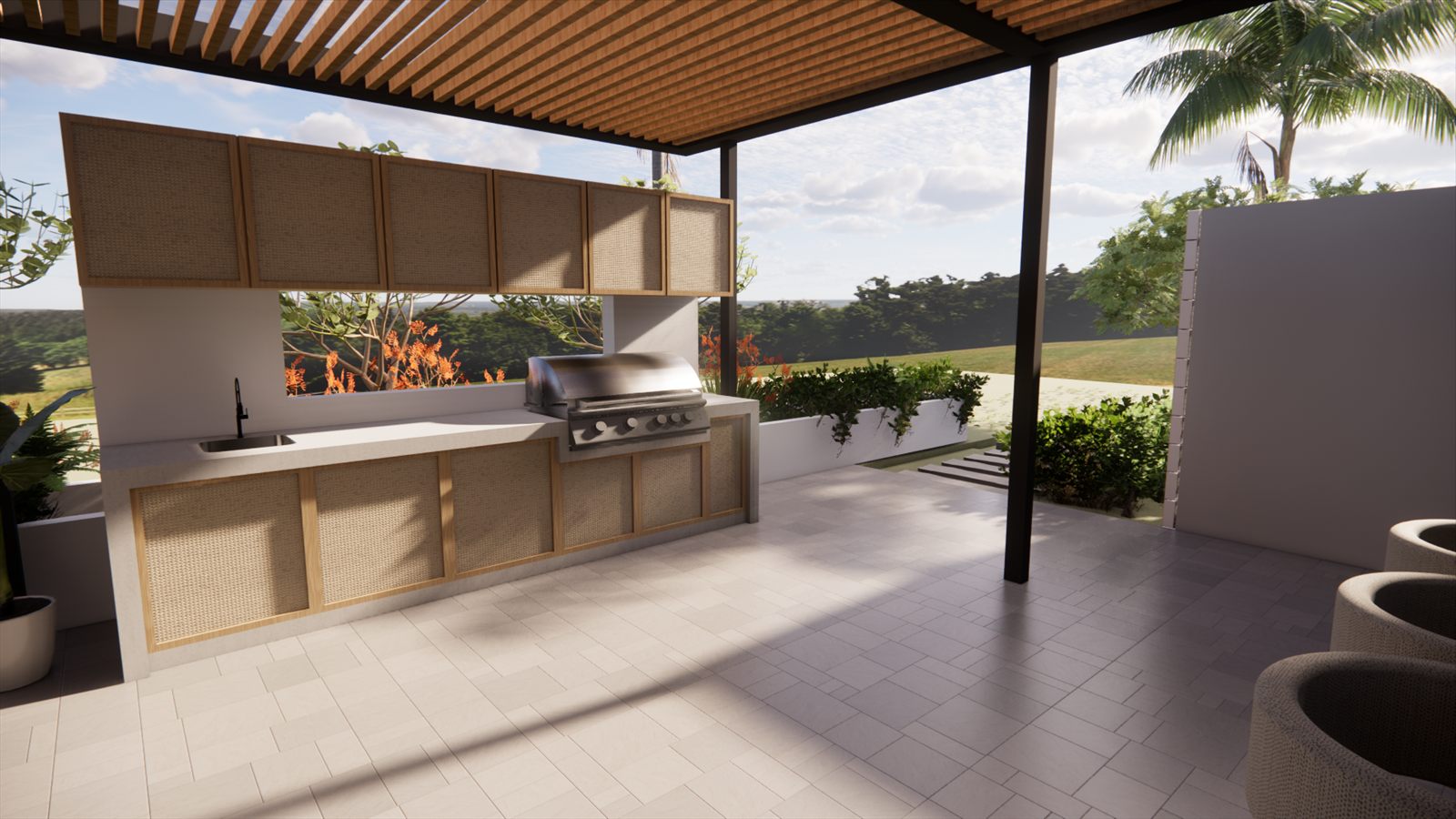 Coral Dreams & Ocean Whispers — covered outdoor kitchen with grill and counter under the pergola.